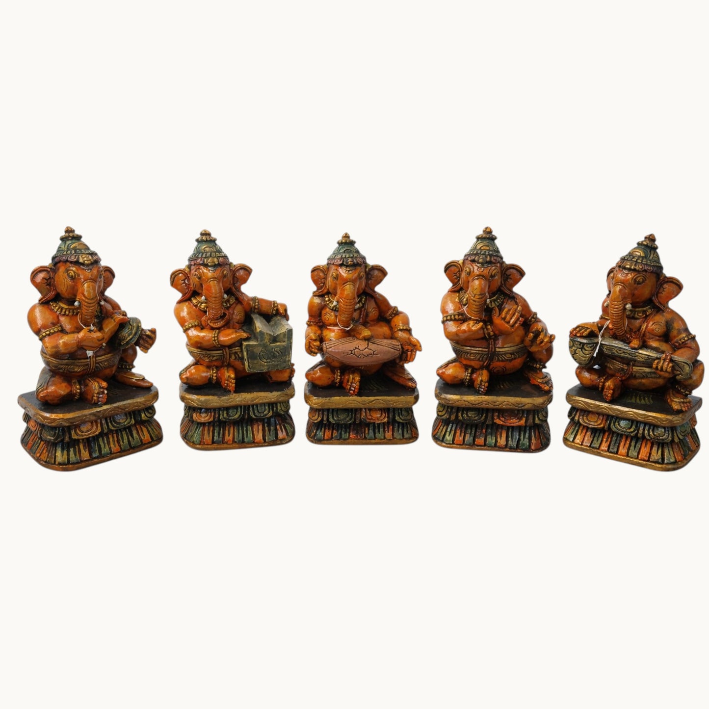 Wooden Musical Ganesha Set of 5 – Hand-Painted Decorative Idol Collection