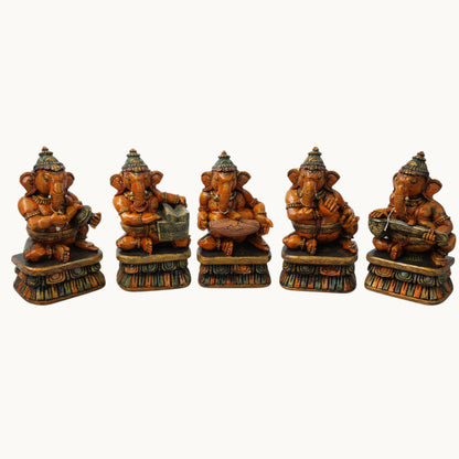 Wooden Musical Ganesha Set of 5 – Hand-Painted Decorative Idol Collection