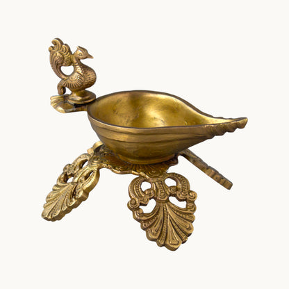 Brass Peacock Deepam on Leaf Base – Traditional Brass Diya for Pooja