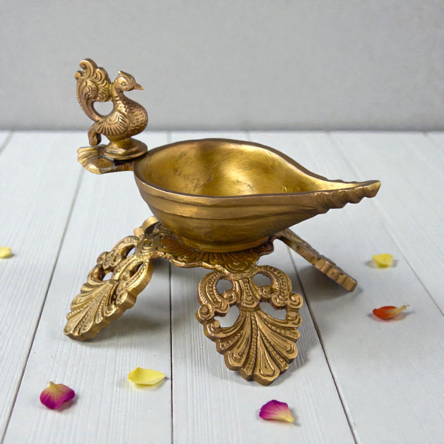 Brass Peacock Deepam on Leaf Base – Traditional Brass Diya for Pooja
