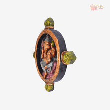 Vaagai Wood Oval shaped Ganesha Idol