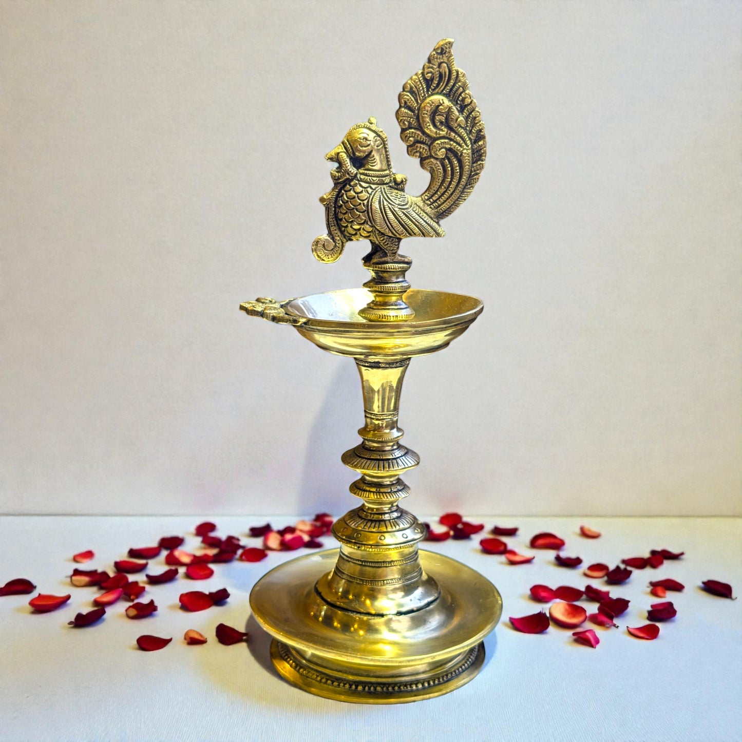 Traditional Brass Peacock Standing Deepam – South Indian Oil Lamp