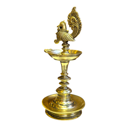 Traditional Brass Peacock Standing Deepam – South Indian Oil Lamp