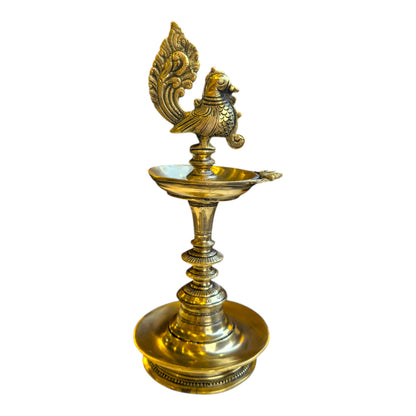 Traditional Brass Peacock Standing Deepam – South Indian Oil Lamp
